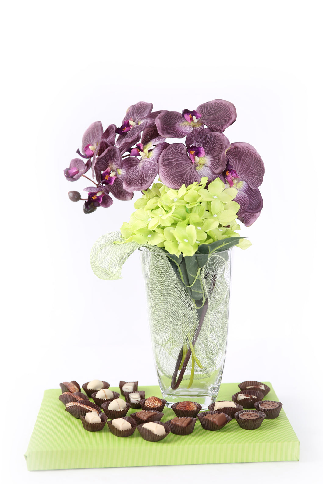 Purple Orchid With Green Hydrangeas In Glass Vase