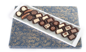 Long white Ceramic tray filled with Chocolates