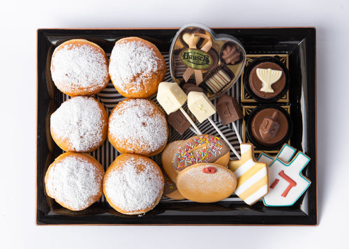 Gorgeous black and white lacquered tray filled with Chanuka goodies