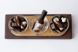 3 glass bowls on wooden base