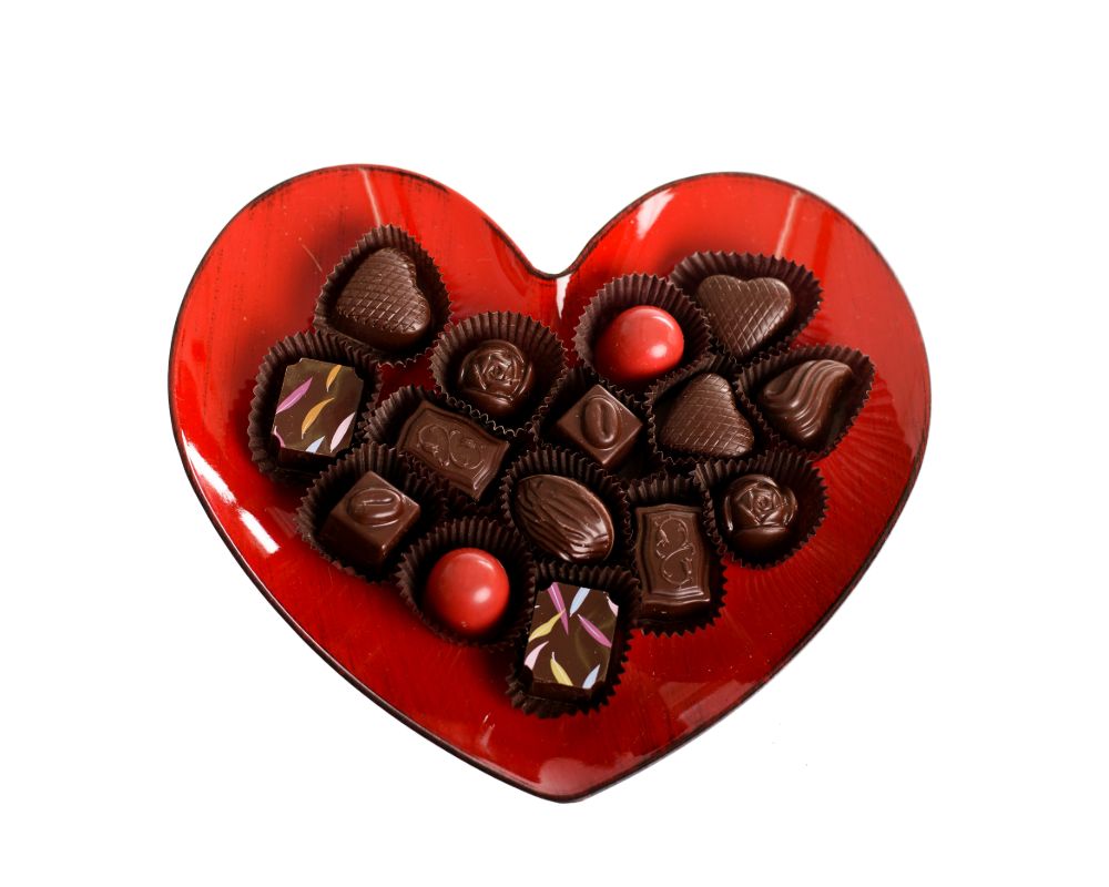 Red heart-shaped pvc plate filled with scrumptious Belgian chocolate!
