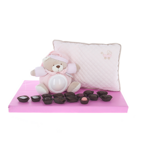 Adorable musical night light teddy and pillow, surrounded by Belgian pralines - girl